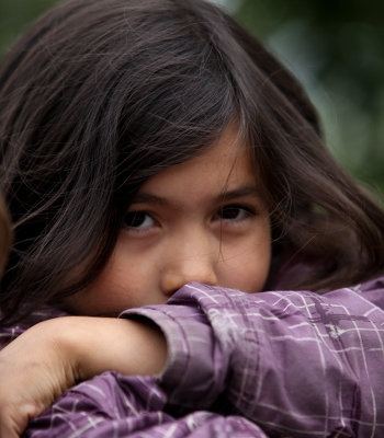 Button to Apply to Forest School, Child Resting Outside